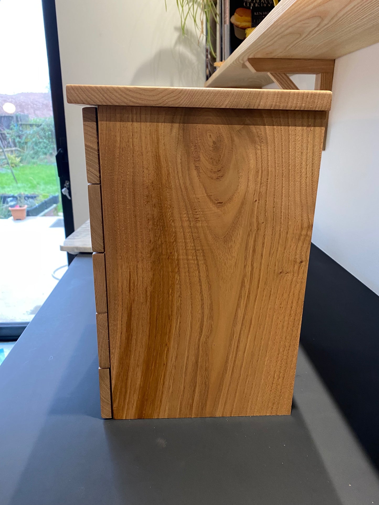 Hardwood countertop drawers.