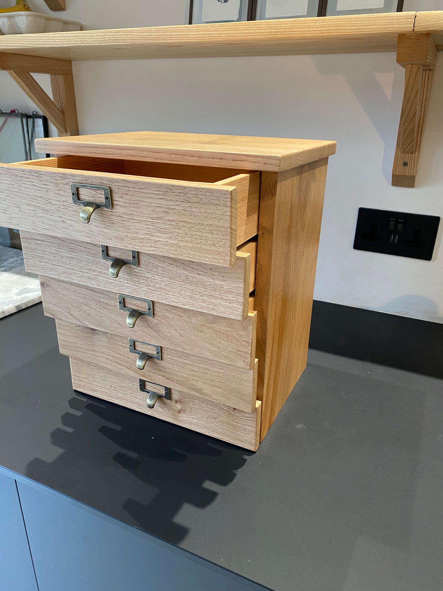 Hardwood countertop drawers.