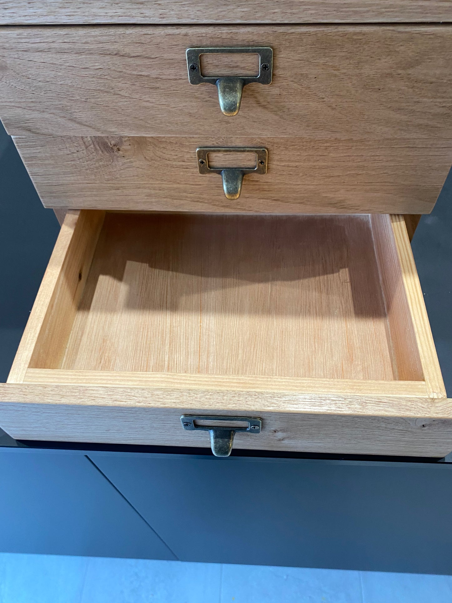 Hardwood countertop drawers.