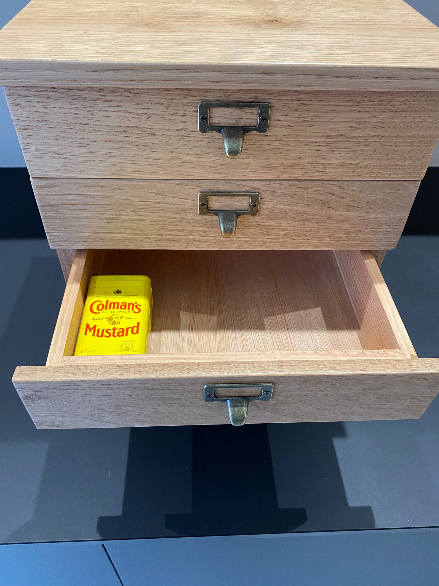 Hardwood countertop drawers.