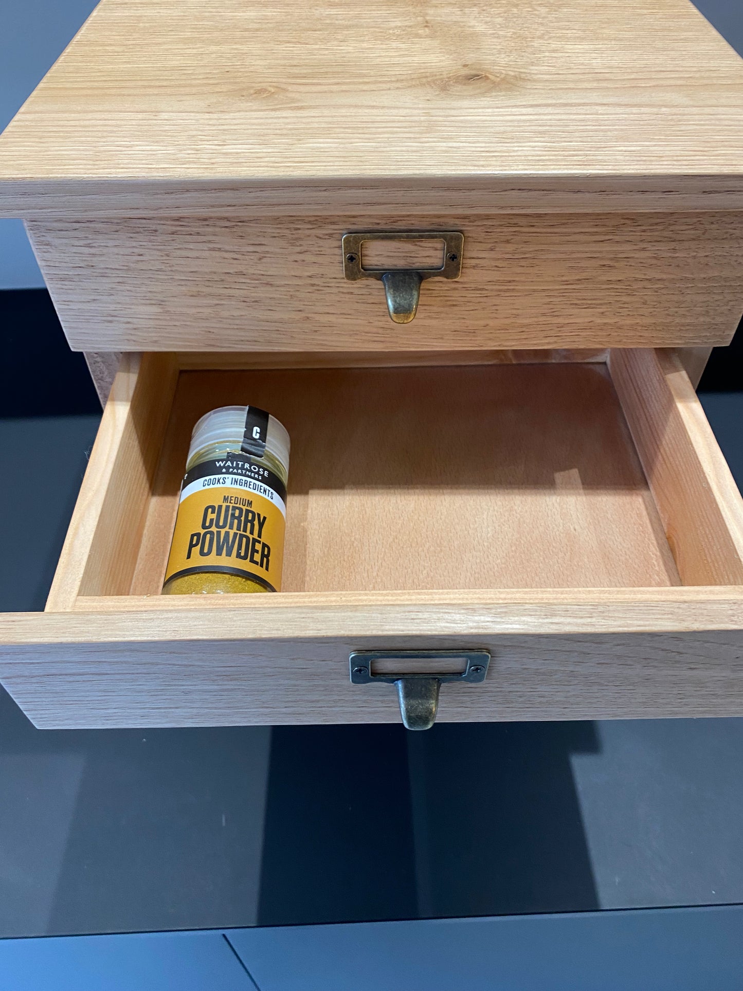 Hardwood countertop drawers.